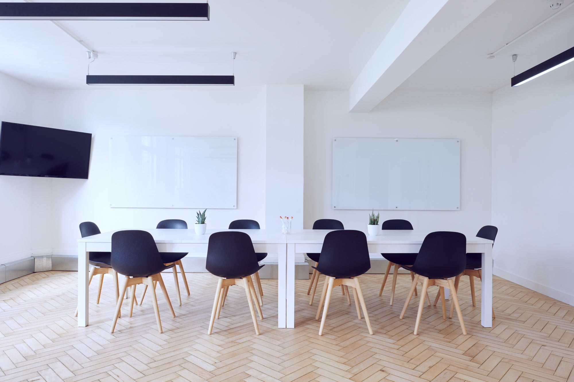 A bright conference room arranged for a working session